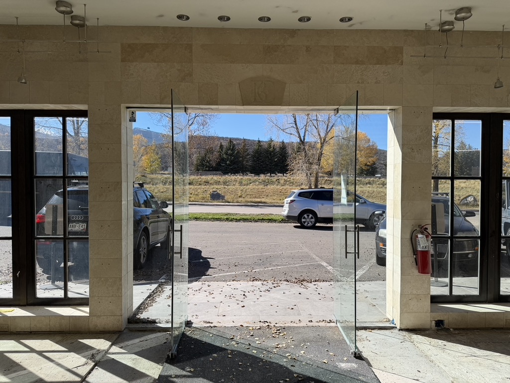 Open glass entry doors