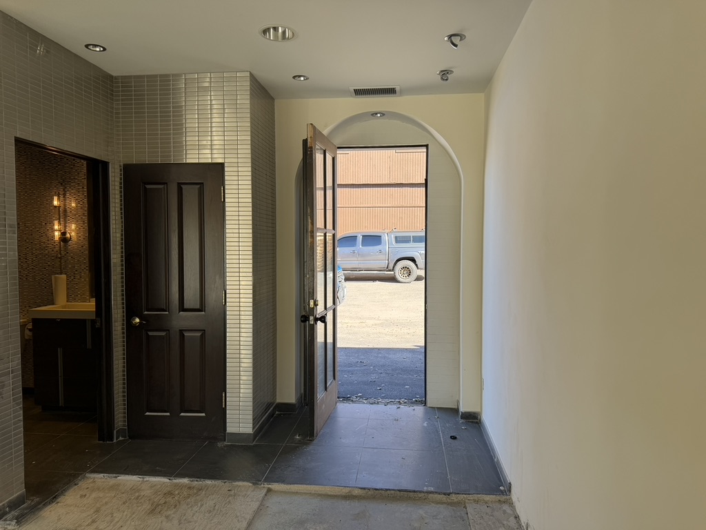 Entry hall and adjacent powder room