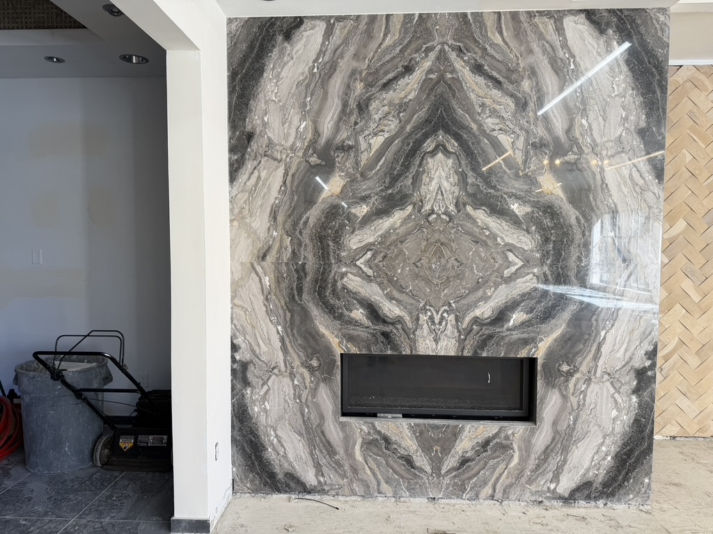 Feature stone wall and fireplace